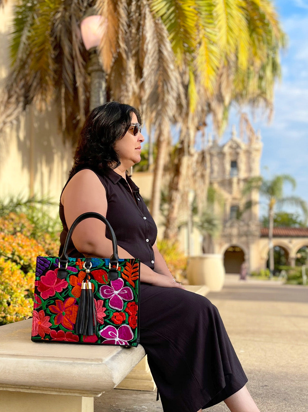 Woman siting beside The Maria Tote 